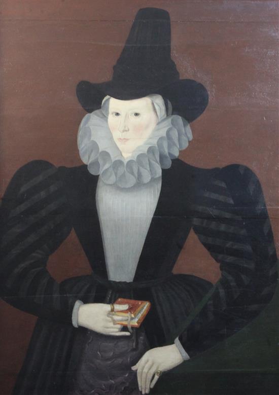 Mid 17th century English School Half length portrait of a lady wearing a ruff collar and memorial ring, and holding a missal 34 x 26in.